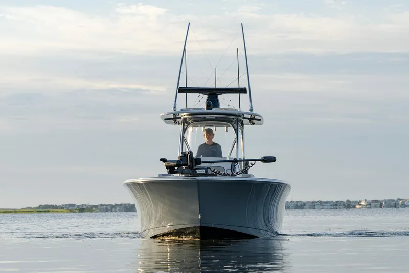 Slide: The Image of 2024 Valhalla Boatworks V-29 Hybrid cruising on calm water, front view. - 3