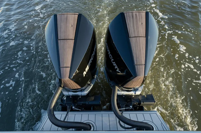 Slide: The Image of 2024 Valhalla Boatworks V-29 Hybrid with dual Mercury outboard engines on water. - 34