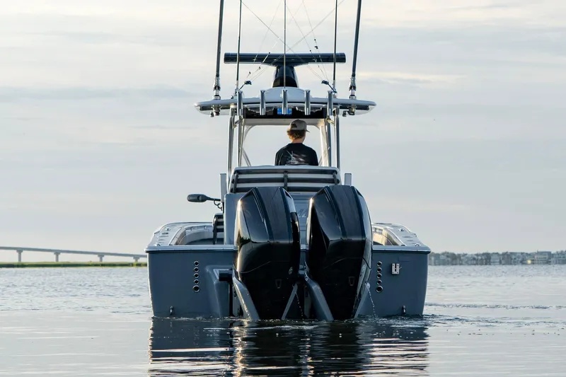 Slide: The Image of 2024 Valhalla Boatworks V-29 Hybrid on water, rear view with dual engines. - 7