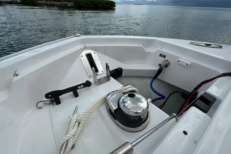 Slide: The Image of 2024 Blackfin 332 CC boat deck with anchor and winch system. - 18