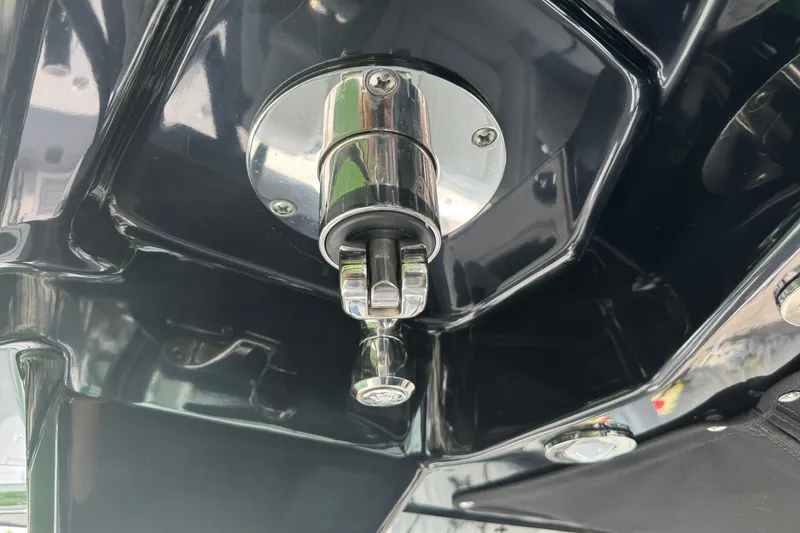 Slide: The Image of Close-up of a 2024 Blackfin 332 CC boat component, showcasing sleek metallic design. - 21