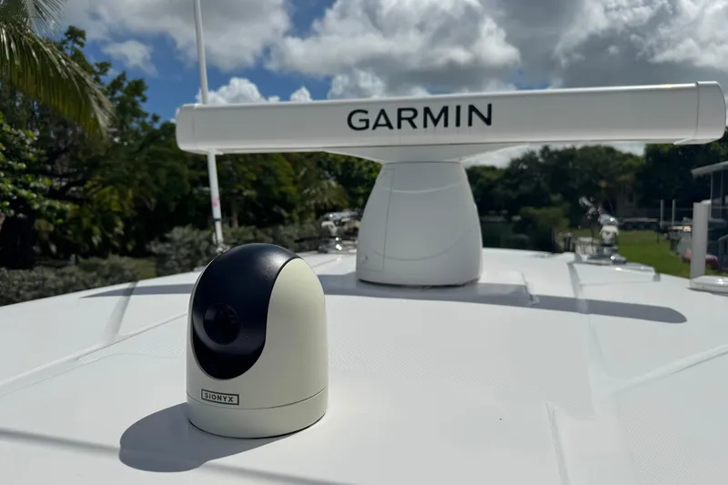 Slide: The Image of 2024 Blackfin 332 CC boat with Garmin radar and Sionyx camera on deck. - 23