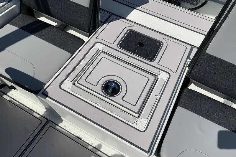 Slide: The Image of 2026 SeaArk Easy 200 boat interior with seating and storage compartments. - 14