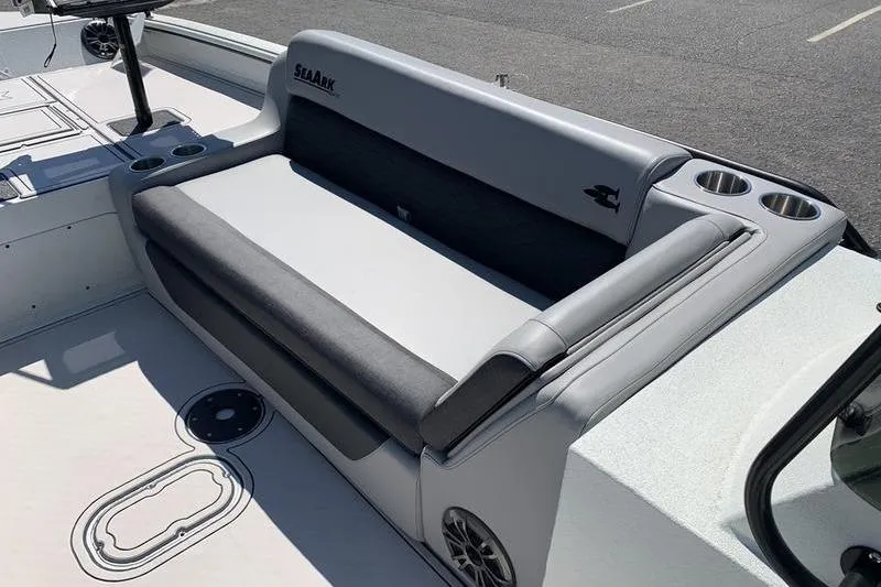Slide: The Image of 2026 SeaArk Easy 200 boat interior with gray seating and cup holders. - 19
