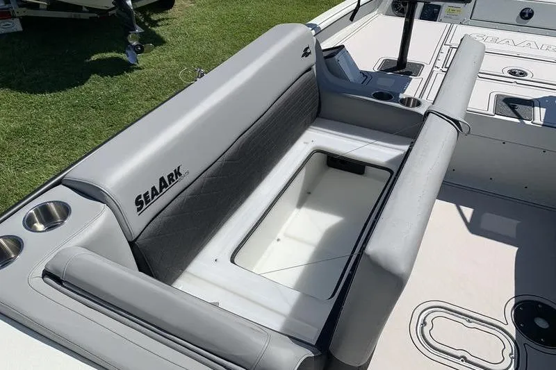 Slide: The Image of 2026 SeaArk Easy 200 boat interior with seating and storage compartment. - 21