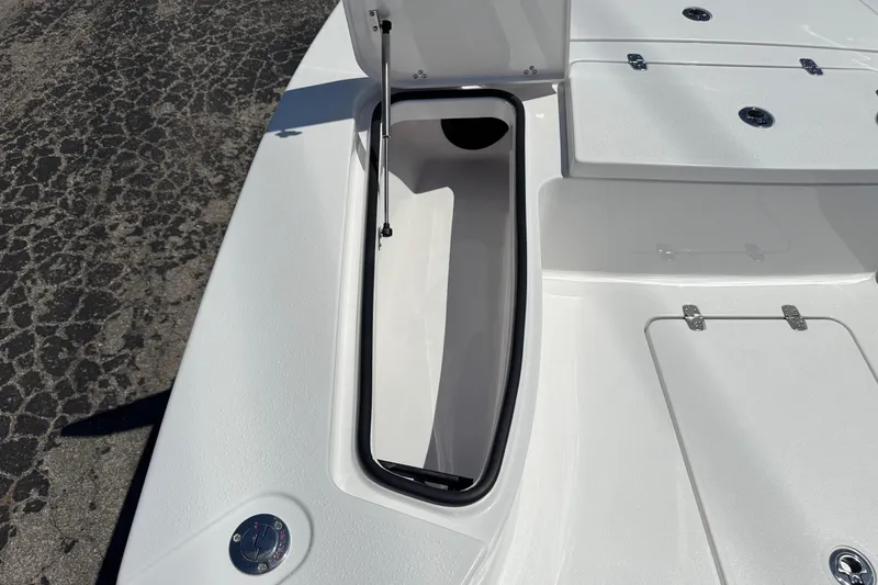 Slide: The Image of 2026 Blazer 675 Ultimate Bay boat storage compartment open on deck. - 19