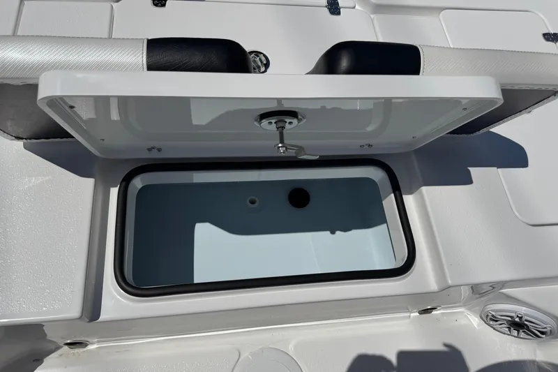 Slide: The Image of 2026 Blazer 675 Ultimate Bay boat livewell with open lid, showcasing interior design. - 34