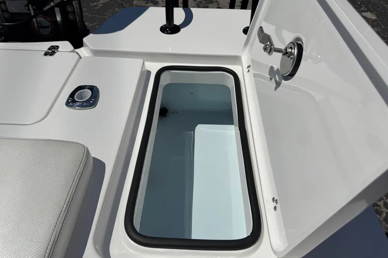 Slide: The Image of Open storage compartment on 2026 Blazer 675 Ultimate Bay boat, showcasing sleek design. - 36