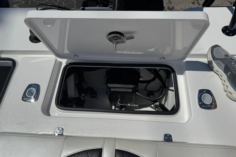 Slide: The Image of Open storage compartment on 2026 Blazer 675 Ultimate Bay boat deck. - 37