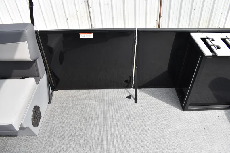 Slide: The Image of Lowe LF 214 boat interior, featuring seating and storage, 2026 model. - 19