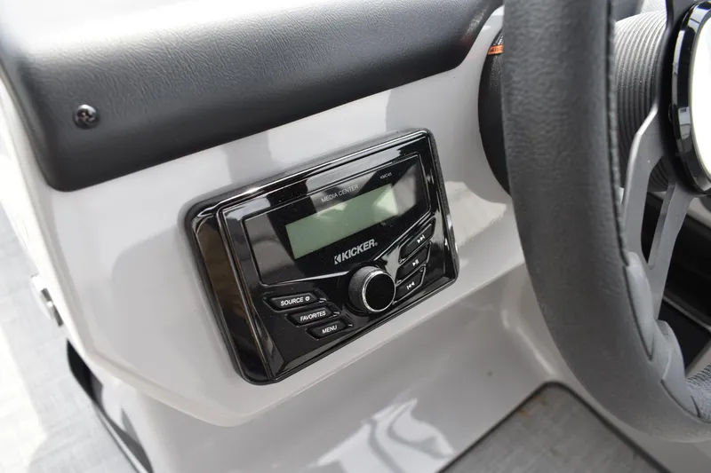 Slide: The Image of Kicker media center in 2026 Lowe LF 214 boat dashboard. - 22