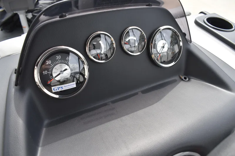 Slide: The Image of Instrument panel of 2026 Lowe LF 214 boat with speedometer, fuel, and RPM gauges. - 23
