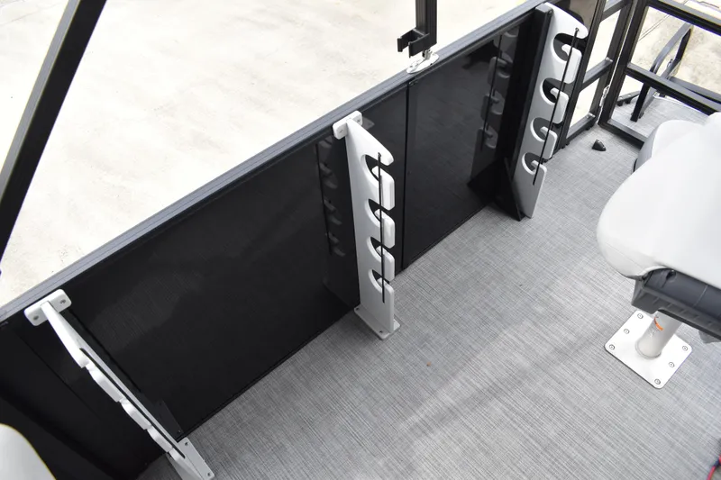 Slide: The Image of 2026 Lowe LF 214 boat interior with rod holders and seating. - 27