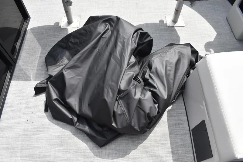 Slide: The Image of Black cover on Lowe LF 214 boat deck, 2026 model. - 31