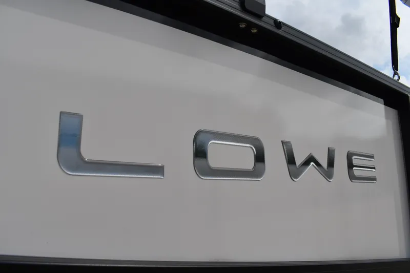Slide: The Image of Close-up of 2026 Lowe LF 214 logo on a sleek surface. - 32