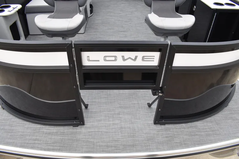 Slide: The Image of 2026 Lowe LF 214 boat interior with seating and branded gate. - 8