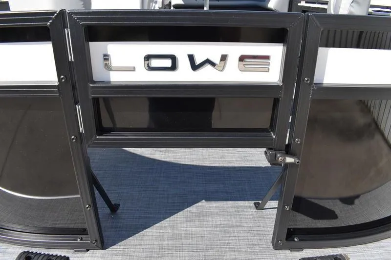 Slide: The Image of Fishing rod holders on a 2026 Lowe LF 214 boat, featuring sleek black and white design. - 18