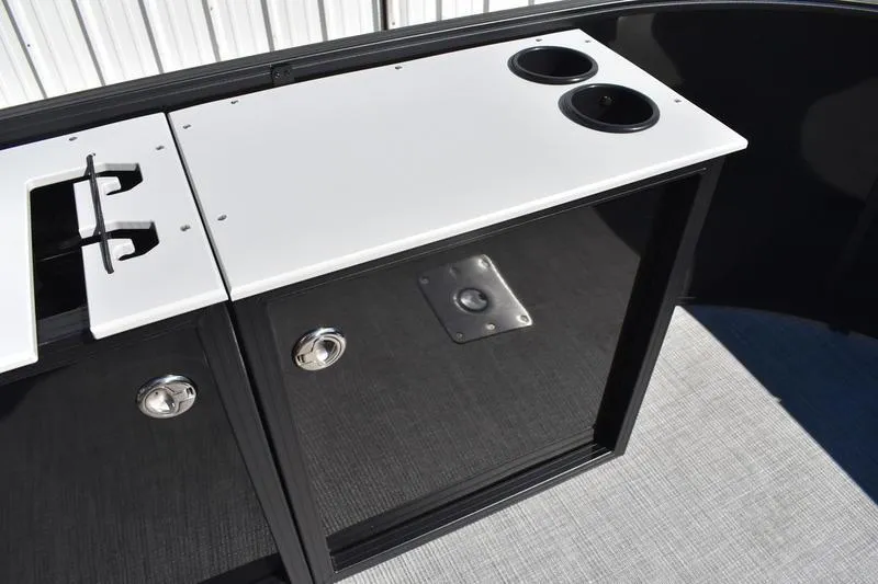 Slide: The Image of ProMariner 10 Amp marine battery charger in Lowe LF 214, 2026 model. - 23