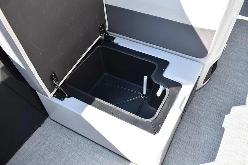 Slide: The Image of 2026 Lowe LF 214 boat cockpit with steering wheel and comfortable seating. - 28