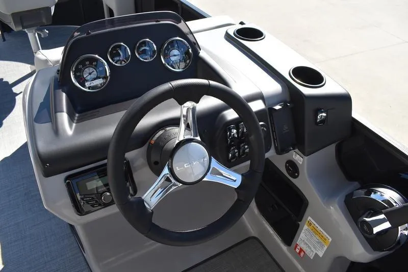 Slide: The Image of Dashboard of 2026 Lowe LF 214 boat with gauges and GPS system. - 35