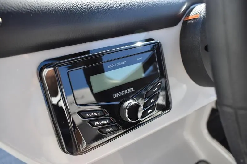 Slide: The Image of 2026 Lowe LF 214 boat interior with black gate and gray flooring. - 39