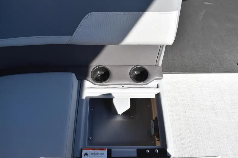 Slide: The Image of 2026 Lowe LF 214 boat interior with gray cushioned seating and cup holders. - 40