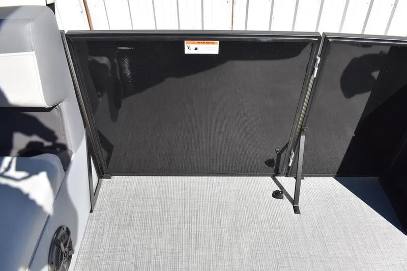 Slide: The Image of Interior of 2026 Lowe LF 214 boat with cup holders and storage compartment. - 41