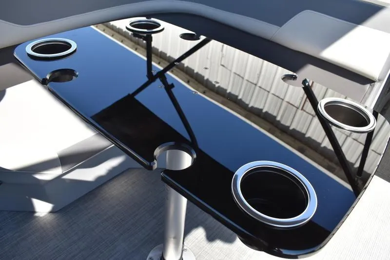 Slide: The Image of Storage compartment in 2026 Lowe LF 214 boat, featuring cushioned seating. - 42