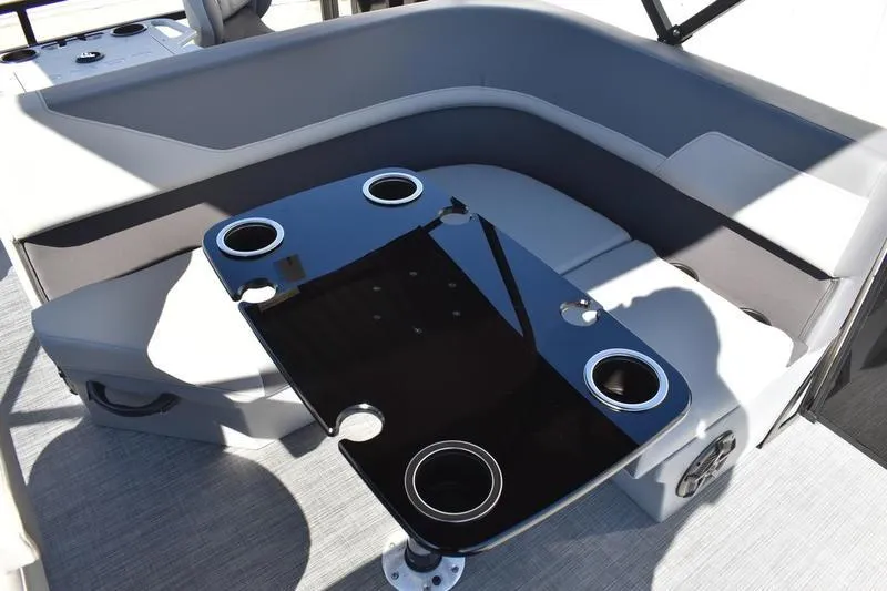 Slide: The Image of Interior of 2026 Lowe LF 214 boat with storage compartment and cup holders. - 43