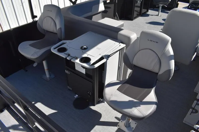 Slide: The Image of Boat console with cup holders and storage, Lowe LF 214, 2026 model. - 50