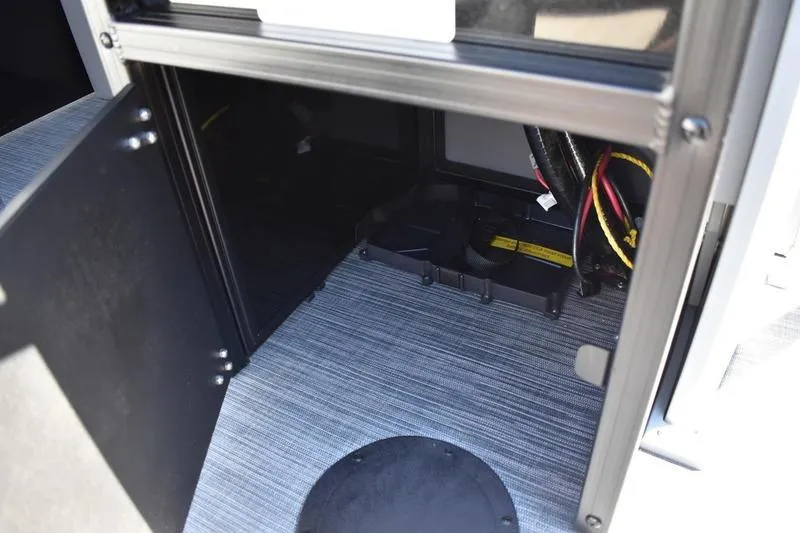 Slide: The Image of 2026 Lowe LF 214 boat deck with black railing and gray flooring. - 53