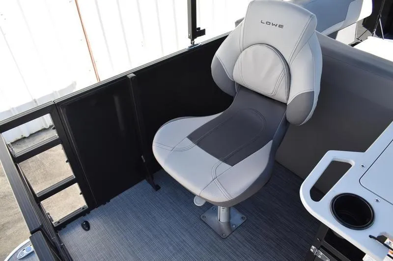 Slide: The Image of Top view of 2026 Lowe LF 214 pontoon boat interior layout with seating and helm. - 55