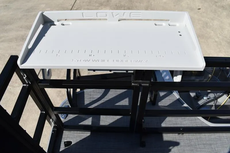 Slide: The Image of Top view of 2026 Lowe LF 214 boat interior layout with seating and console. - 56