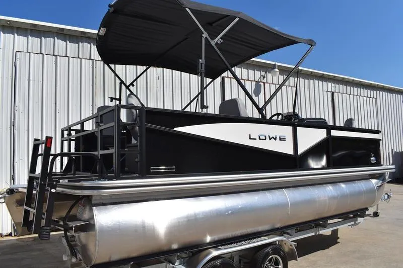 Slide: The Image of 2026 Lowe LF 214 pontoon boat interior with modern seating and railing design. - 7