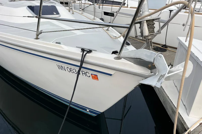 Slide: The Image of Catalina 36 sailboat, 1993 model, docked with visible registration number. - 3