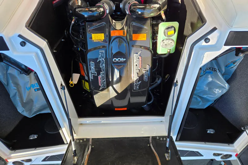 Slide: The Image of 2021 Tigé 22RZX boat engine compartment with Raptor 6.2L engine. - 11
