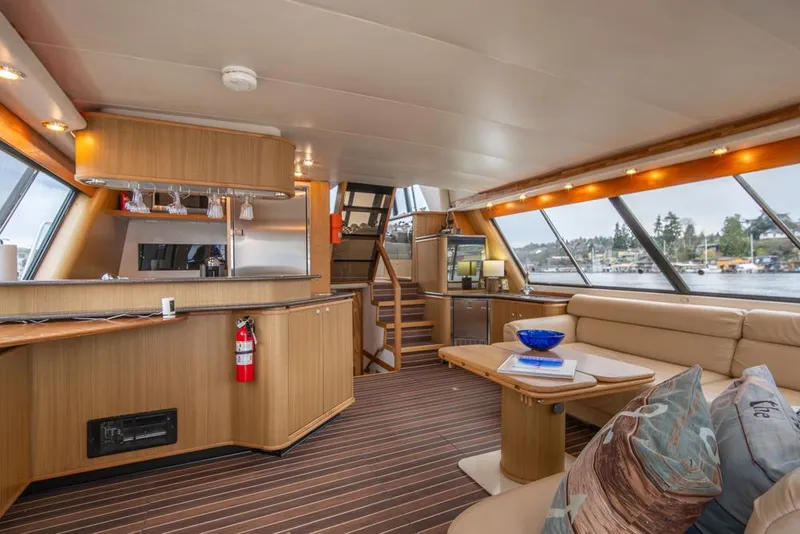 Slide: The Image of Luxurious interior of 2000 Bayliner 4788 Pilot House Motoryacht with modern amenities. - 9