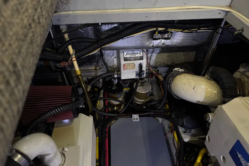 Slide: The Image of Engine room of 2002 Silverton 352 Motor Yacht with oil change system. - 111