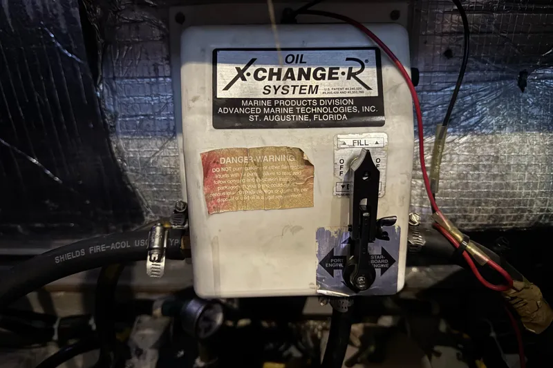Slide: The Image of Oil X-Change-R system in 2002 Silverton 352 Motor Yacht engine room. - 112