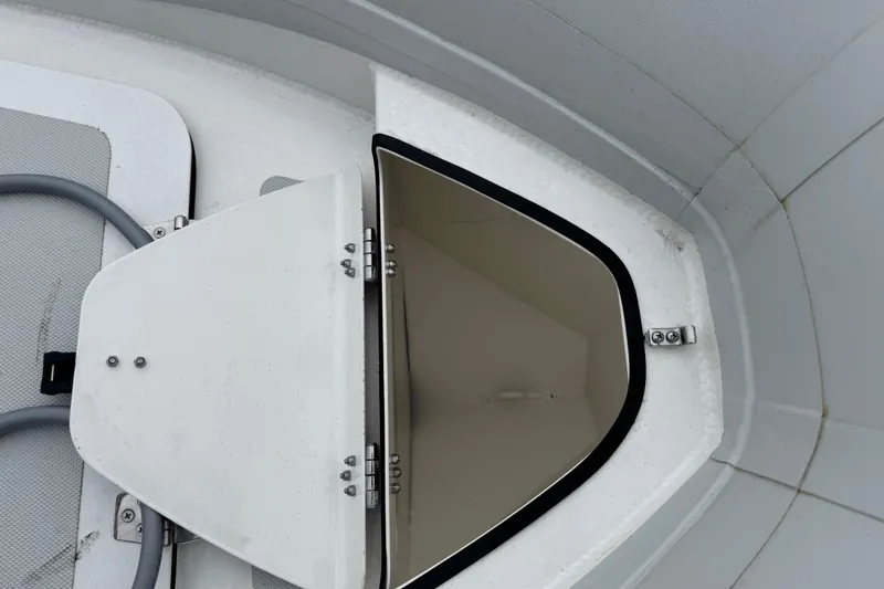 Slide: The Image of Open hatch on 2002 Silverton 352 Motor Yacht, showing interior compartment. - 12