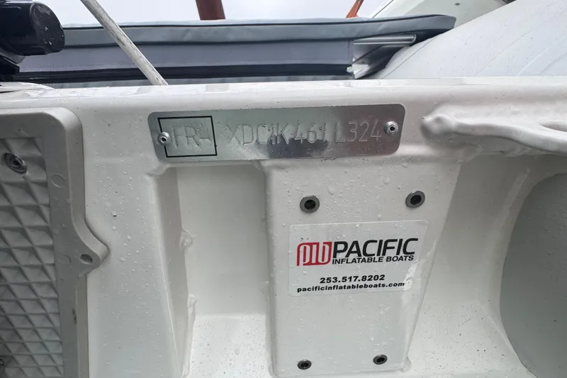 Slide: The Image of 2002 Silverton 352 Motor Yacht with Pacific Inflatable Boats label and serial number plate. - 15