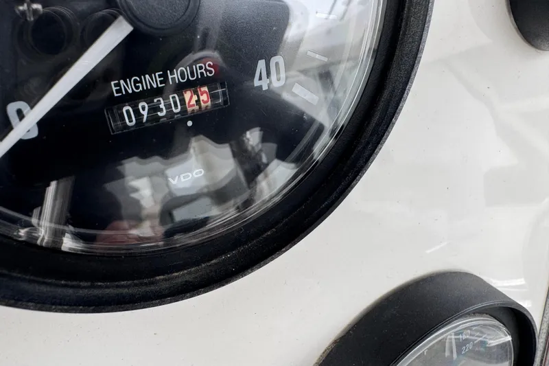 Slide: The Image of Close-up of 2002 Silverton 352 Motor Yacht engine hours gauge showing 930.25 hours. - 28