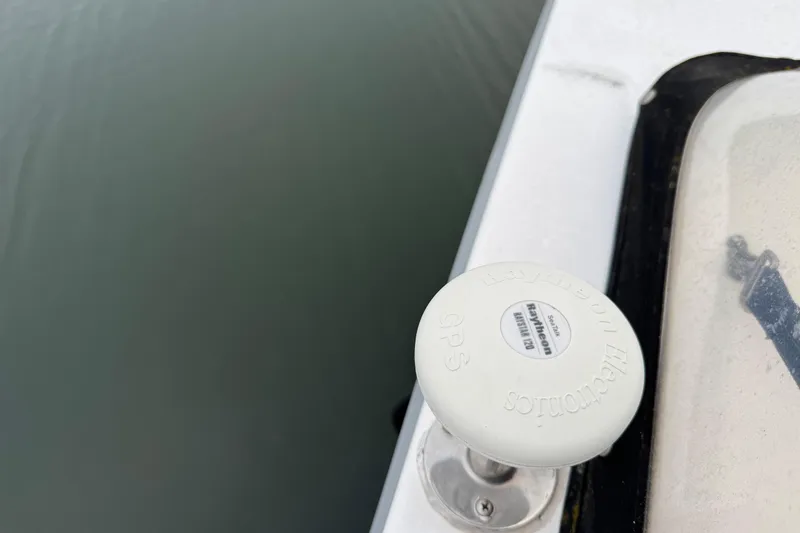 Slide: The Image of 2002 Silverton 352 Motor Yacht with Raytheon GPS antenna on deck. - 41