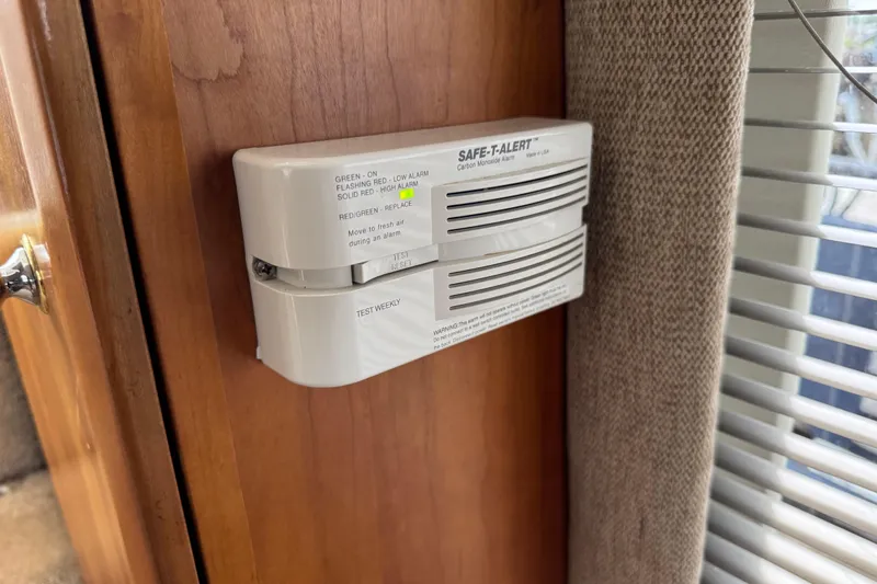 Slide: The Image of Carbon monoxide alarm on 2002 Silverton 352 Motor Yacht interior wall. - 58