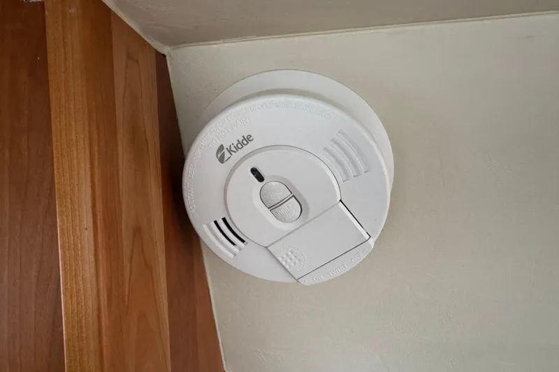 Slide: The Image of Smoke detector installed on a 2002 Silverton 352 Motor Yacht ceiling. - 60