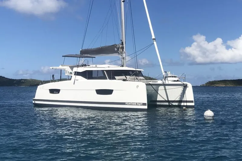 The Image of 2021 Fountaine Pajot Isla 40 catamaran sailing on calm blue waters. - 1