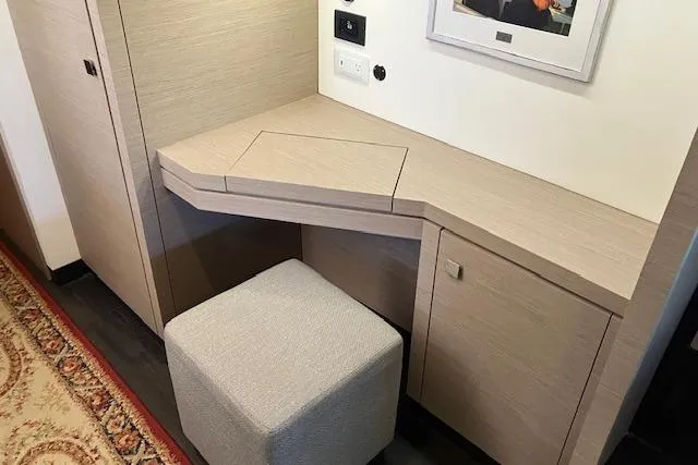 Slide: The Image of Modern desk area in a 2021 Fountaine Pajot Isla 40 yacht interior. - 11