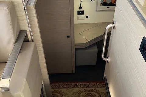 Slide: The Image of Interior of 2021 Fountaine Pajot Isla 40 catamaran, featuring modern design and cozy seating. - 15