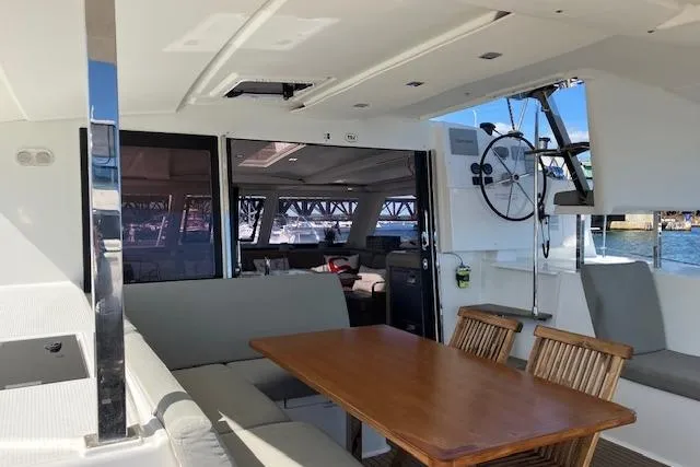 Slide: The Image of Spacious interior of 2021 Fountaine Pajot Isla 40 catamaran with dining area and helm. - 30