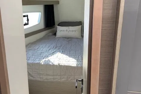 Slide: The Image of Cozy bedroom in 2021 Fountaine Pajot Isla 40 catamaran with window view. - 41